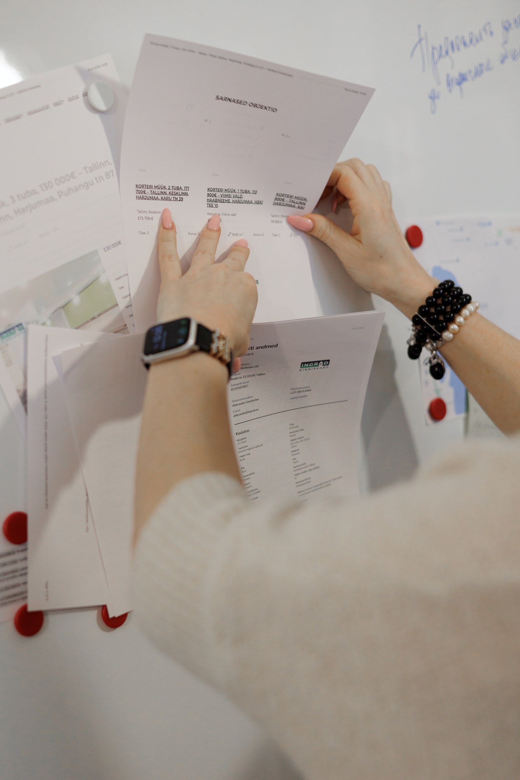 Client reviewing property documents during a buying consultation