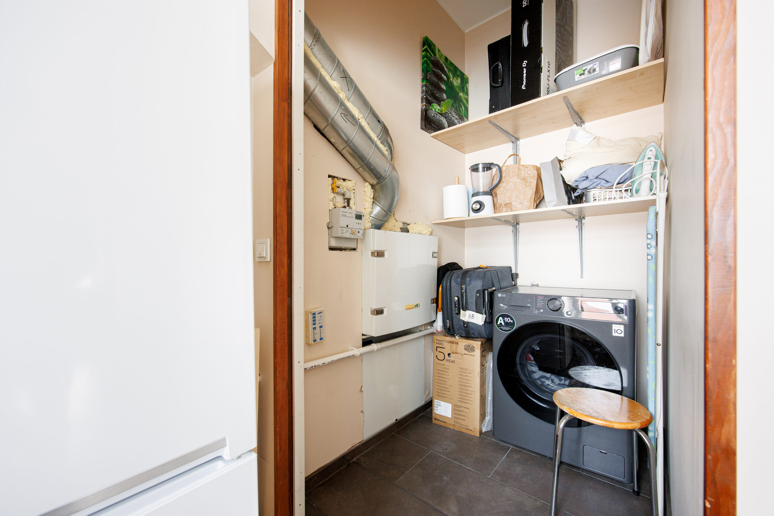 Storage closet before decluttering